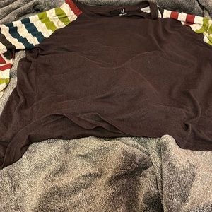 A charcoal gray shirt with white burgundy blue and green sleeves never worn.